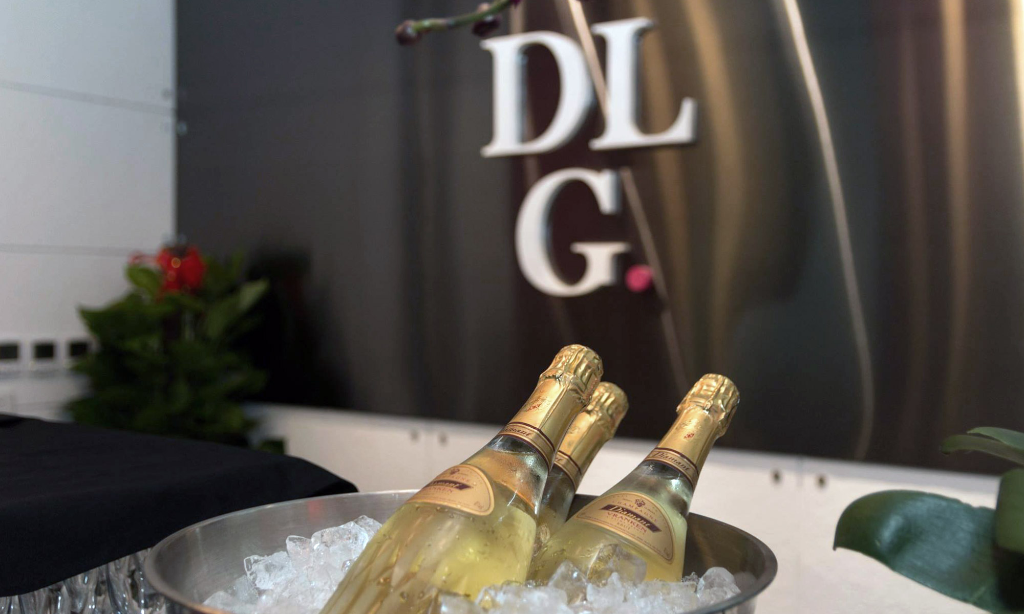 DLG logo with champagne